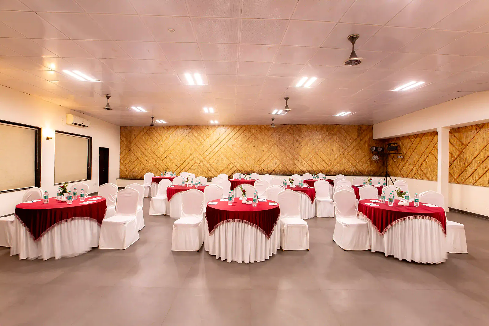 The Cloud 9 conference hall set with tables for a meeting