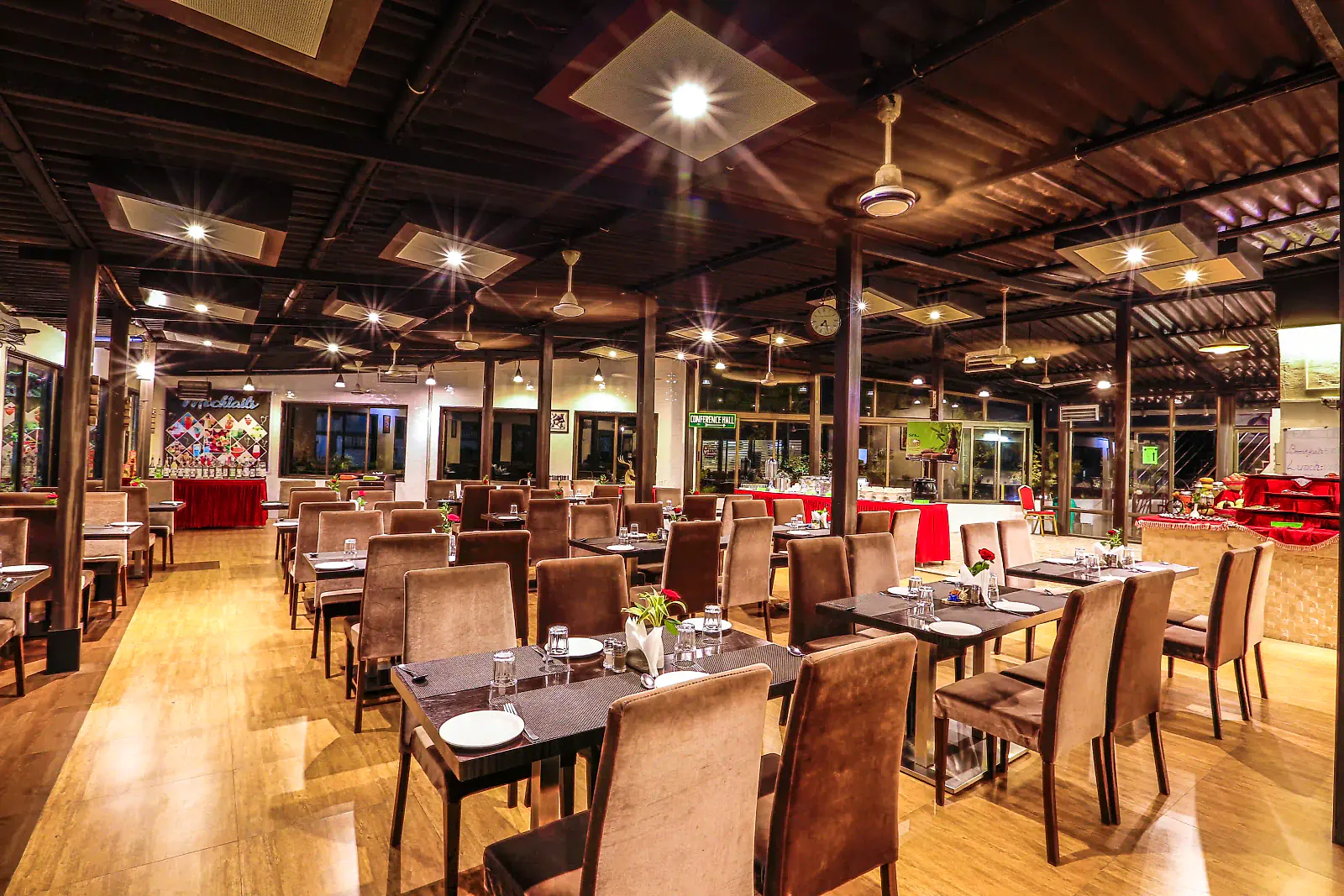 The 7 Heaven restaurant with wooden beams and tables by the windows