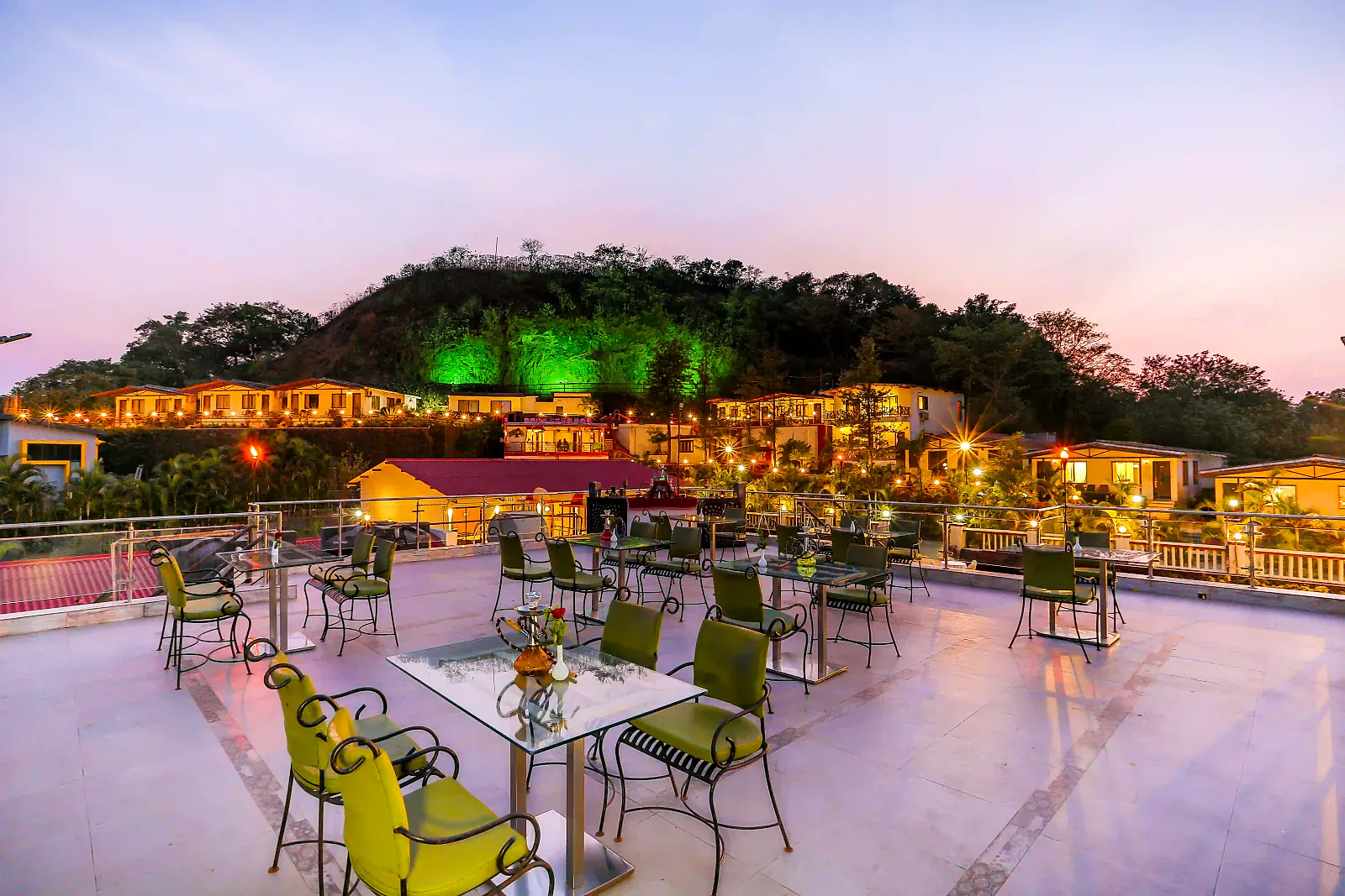 Open-air rooftop dining at Cloud 9 Hills Resort with views over the Lonavala valley