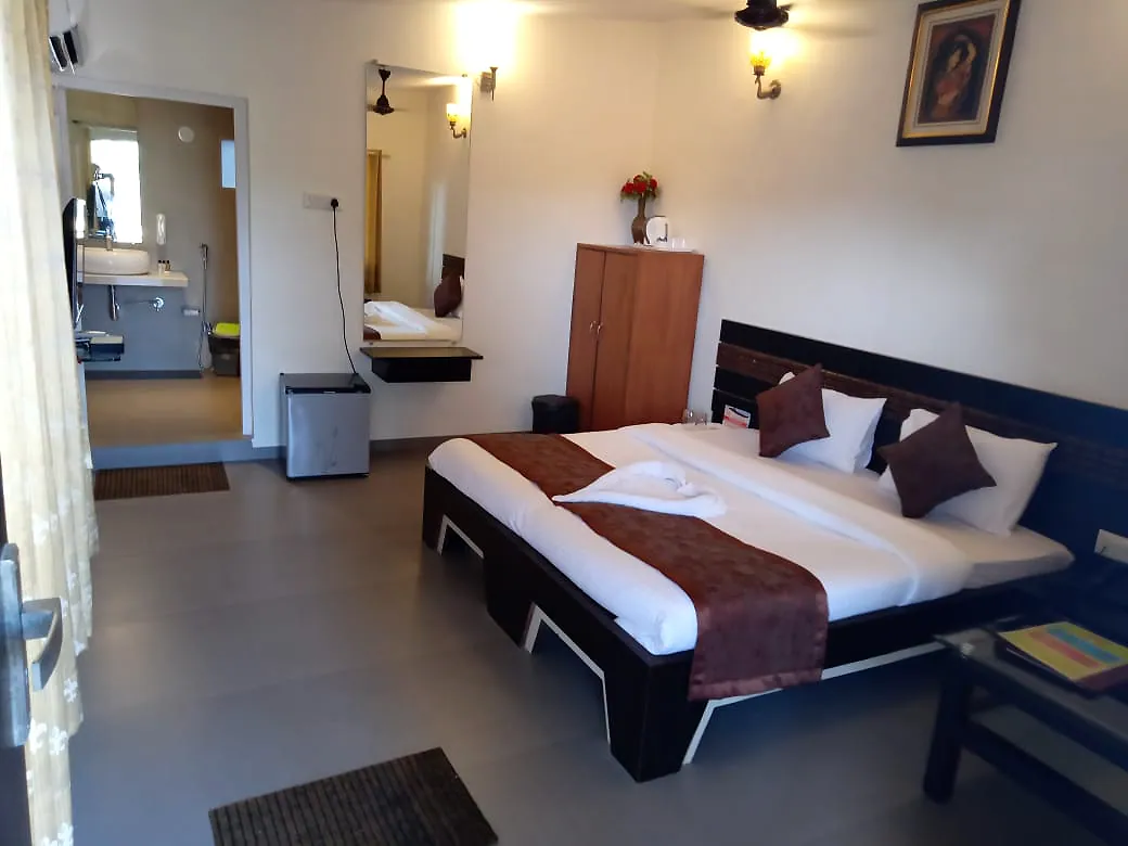 Hill Top Deluxe Cottage bedroom